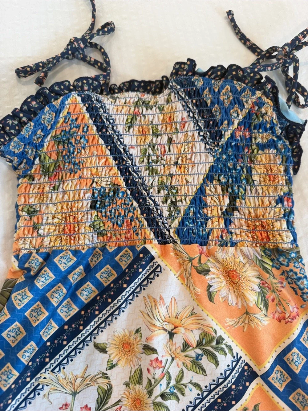 Agua Bendita Girls Floral Patchwork One-Piece Swimsuit in Blue and Orange